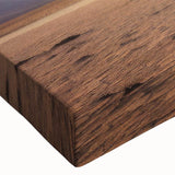 Close-up view of a vibrant stretched canvas wall art piece showcasing a detailed landscape design with trees, featuring rich green and earthy tones, ideal for home decor.