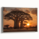 Framed canvas wall art showcasing a serene landscape with trees, featuring a silver frame and elegant design, perfect for enhancing modern home decor.