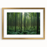 Gold-framed wall art showcasing a serene landscape design with trees, presented with a white mat, perfect for enhancing home décor in any room.