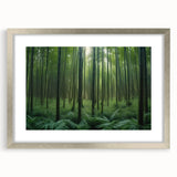 Framed wall art featuring a scenic landscape design with trees, presented in a sleek silver frame with a mat. Ideal for enhancing home decor and adding a natural touch.