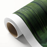 Rolled canvas showcasing a vibrant landscape design with lush green trees and a serene sky, perfect for home decor, presented in a protective cardboard tube.