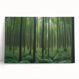 Stretched canvas wall art featuring a vibrant landscape design with trees, leaning against a neutral wall, ideal for home decor and nature lovers.