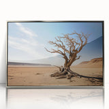 Framed wall art showcasing a stunning landscape design with vibrant green trees and a silver acrylic frame, ideal for enhancing modern home decor.