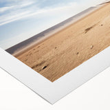 Rolled canvas wall art showcasing a vibrant landscape of trees, featuring lush green foliage and a serene blue sky, ideal for home decor.