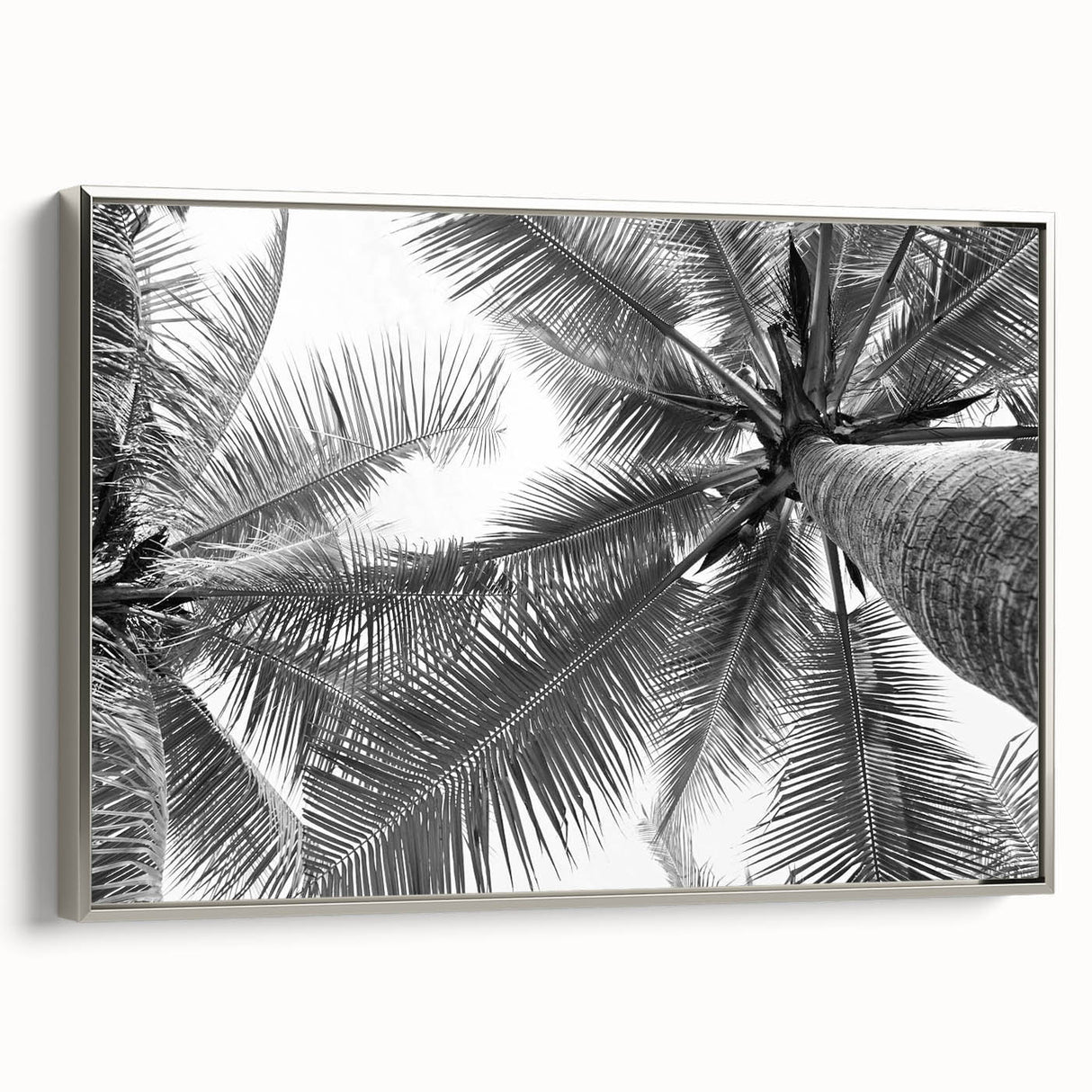 Framed canvas wall art depicting a serene landscape with trees, showcasing intricate details and a silver frame, perfect for home decor. Ideal for nature lovers.