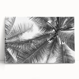 Stretched canvas wall art showcasing a serene landscape with vibrant green trees and a tranquil blue sky, perfect for enhancing home decor and creating a calming atmosphere.