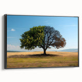 Framed canvas wall art featuring a serene landscape with trees, presented in a sleek black frame, ideal for enhancing home decor or office settings.