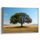 Framed canvas wall art featuring a serene landscape with trees, elegantly designed in silver tones, showcasing a side view perspective for modern decor.