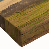 Close-up of a stretched canvas wall art piece showcasing a vibrant landscape with trees, rich colors, and intricate details, perfect for home decor enhancement.