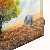 Close-up of a vibrant acrylic wall art piece showcasing a serene landscape with lush green trees and a colorful sunset, perfect for home decor enhancement.