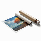 Vibrant rolled wall art print showcasing a serene landscape with lush green trees and a soft blue sky, perfect for home decor and nature-themed interiors.