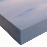 Close-up of a stretched canvas wall art featuring a vibrant landscape design with lush green trees, showcasing intricate details and rich colors, perfect for home decor.