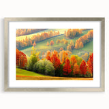 Framed wall art design showcasing lush green landscapes with trees, featuring a silver mat and elegant frame, perfect for enhancing home decor.