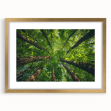 Elegant wall art featuring a landscape design with trees, framed in gold and accented with a white mat, showcasing a serene and sophisticated aesthetic perfect for home decor.