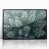 Framed wall art featuring a vibrant landscape design with trees, presented in a sleek black frame, showcasing a modern aesthetic for home decor enthusiasts.