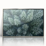 Framed wall art showcasing a modern landscape design with silver accents, featuring a serene tree silhouette against a vibrant sunset background. Perfect for contemporary home decor.