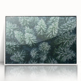 Framed wall art showcasing a serene landscape with vibrant trees and a calming color palette, presented in a sleek white frame, perfect for home decor.