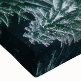 Close-up of a vibrant stretched canvas featuring a detailed landscape design with lush green trees, ideal for home decor and nature enthusiasts. The artwork showcases rich colors and intricate textures, enhancing any interior space.