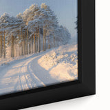 Close-up of a framed canvas wall art featuring a vibrant landscape design with lush green trees and a serene blue sky, perfect for home decor.