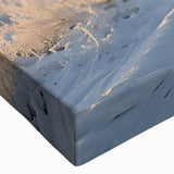 Close-up of a stretched canvas wall art piece featuring a vibrant landscape with lush green trees and a serene sky, perfect for enhancing interior decor.