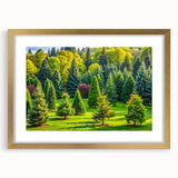 Framed wall art depicting a serene landscape with trees, featuring a gold mat and elegant frame, perfect for enhancing home decor in any setting.