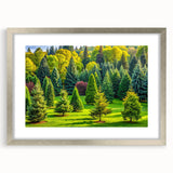 Framed wall art featuring a serene landscape design with trees, set in a silver frame with a mat, ideal for enhancing home decor and creating a tranquil atmosphere.