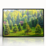 Framed wall art featuring a vibrant landscape design with stylized trees, displayed in a sleek black frame, perfect for modern home decor.