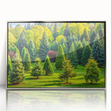 Framed acrylic wall art showcasing a serene landscape with lush green trees, set in a sleek silver frame, ideal for enhancing modern home decor.