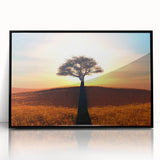 Framed acrylic wall art featuring a vibrant landscape design with trees, displayed in a sleek black frame, perfect for enhancing modern home decor.