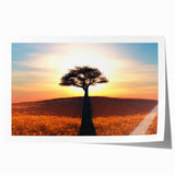 Rolled print of a tranquil landscape featuring tall, slender trees against a soft, pastel sky, perfect for modern home decor or art enthusiasts.