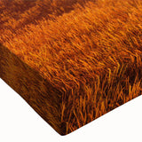 Close-up of a stretched canvas artwork featuring vibrant green trees and a serene landscape, ideal for enhancing home decor with nature-inspired aesthetics. Perfect for those seeking to add tranquility and color to their living spaces.