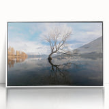 Framed acrylic wall art showcasing a serene landscape with vibrant green trees, set in a sleek white frame, ideal for modern home decor.