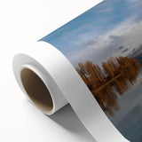 Rolled canvas artwork showcasing a vibrant landscape design with lush trees and a serene atmosphere, ideal for enhancing home decor. Packaged securely in a sturdy cardboard tube for safe delivery.