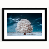 Framed wall art featuring a serene landscape design with trees, set in a sleek black frame with a mat, ideal for home decor and nature enthusiasts.