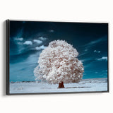 Framed canvas wall art showcasing a serene landscape with vibrant green trees, designed to enhance home decor, viewed from the side against a neutral background.