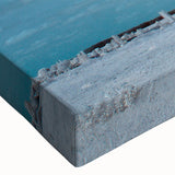 Close-up of a vibrant stretched canvas wall art piece featuring a detailed landscape with lush green trees and a serene blue sky, perfect for home decor.