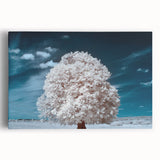 Stretched canvas artwork showcasing a serene landscape with lush green trees and a tranquil sky, perfect for home decor or office ambiance.