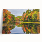 Stretched canvas wall art featuring a vibrant landscape design with lush green trees and blue skies, ideal for adding a serene natural touch to home decor.