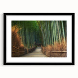 Framed wall art featuring a serene landscape with trees, set in a sleek black frame with a white mat, perfect for enhancing home decor and adding a touch of nature.