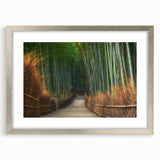 Framed wall art showcasing a serene landscape with trees, featuring a silver mat and frame, ideal for home decor and enhancing living spaces.