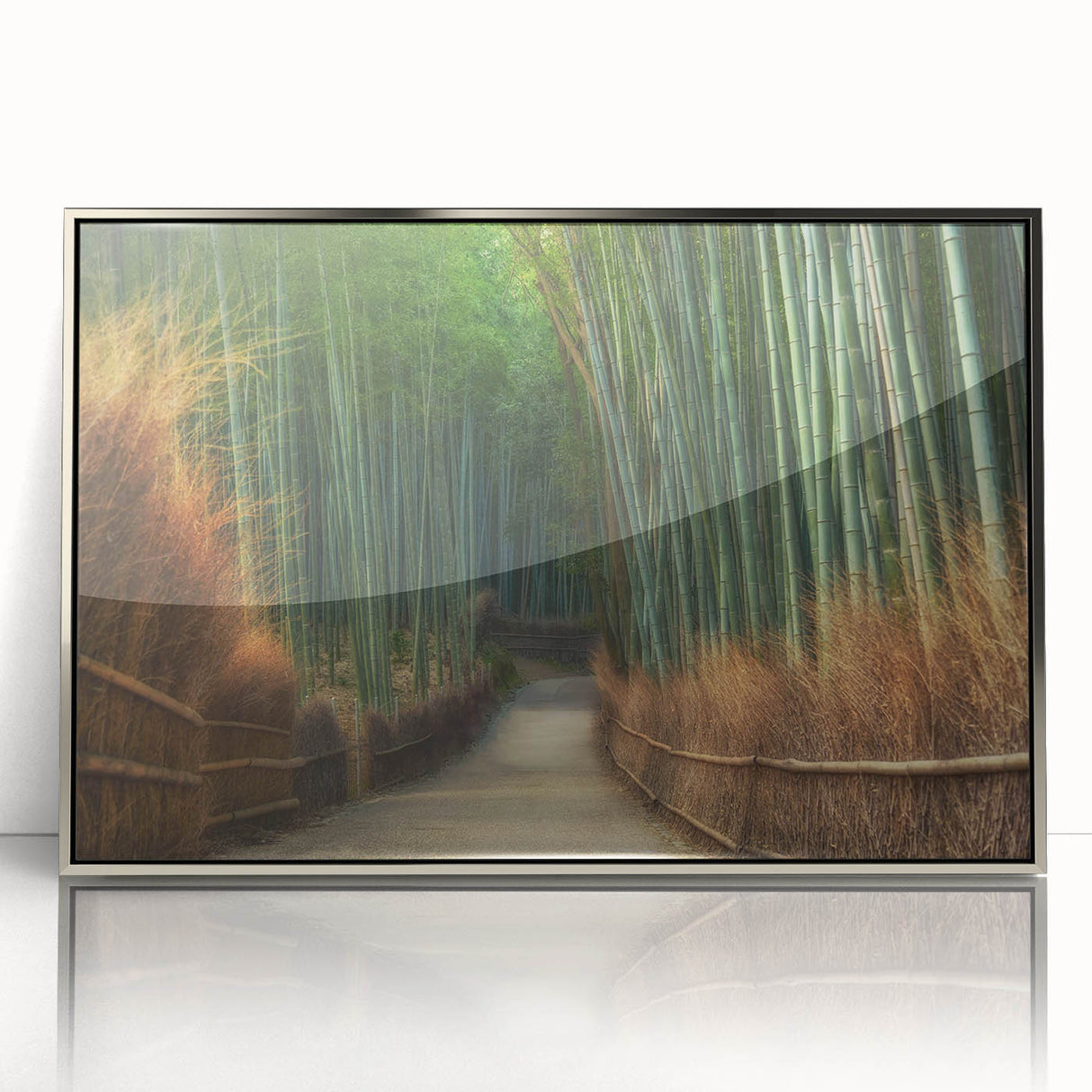 Framed wall art showcasing a serene landscape with vibrant green trees and a silver-accented frame, perfect for home decor and nature lovers.