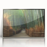 Framed wall art showcasing a serene landscape with vibrant green trees and a silver-accented frame, perfect for home decor and nature lovers.