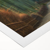 Rolled canvas artwork showcasing a serene landscape with vibrant trees and earthy tones, ideal for home decor, packaged securely in a durable tube.