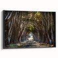 Framed canvas wall art showcasing a serene landscape with trees, featuring a black frame and side view, perfect for enhancing modern home decor.