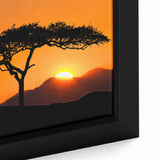 Framed canvas artwork showcasing a vibrant landscape with lush green trees and a serene blue sky, perfect for adding a nature-inspired touch to home decor.