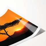 Stylish rolled print showcasing a vibrant landscape with lush green trees and serene blue skies, perfect for adding a natural touch to home decor. Ideal for nature lovers and art enthusiasts.