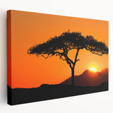 Stretched canvas wall art showcasing a serene landscape with vibrant green trees and a tranquil sky, perfect for enhancing home decor and creating a calming atmosphere.