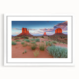 Framed wall art depicting a serene valley landscape with soft colors and intricate details, presented with a white mat for a classic touch, ideal for home decor.