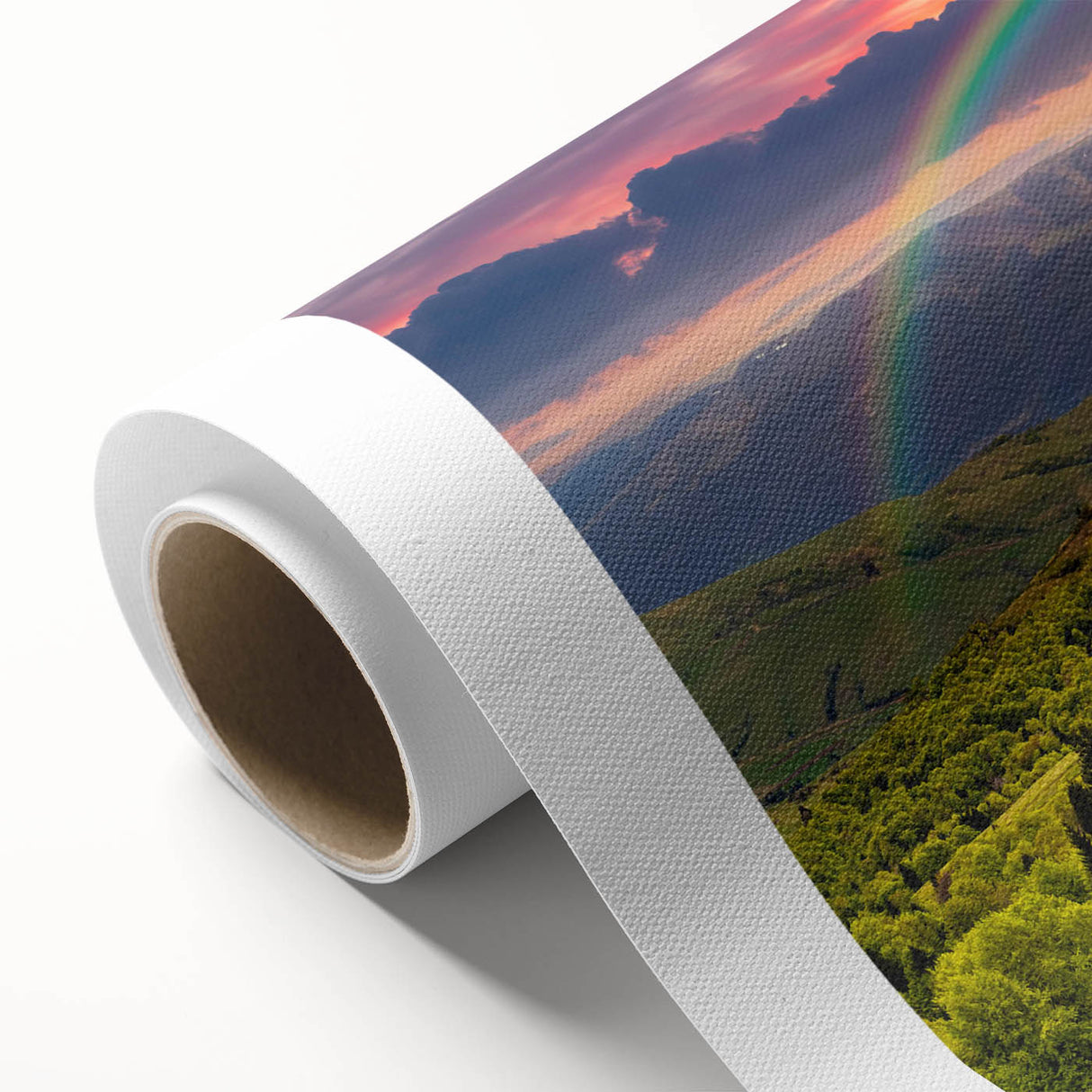 Vibrant rolled canvas artwork depicting a serene valley landscape with lush greenery and distant mountains, packaged for safe delivery in a protective tube.
