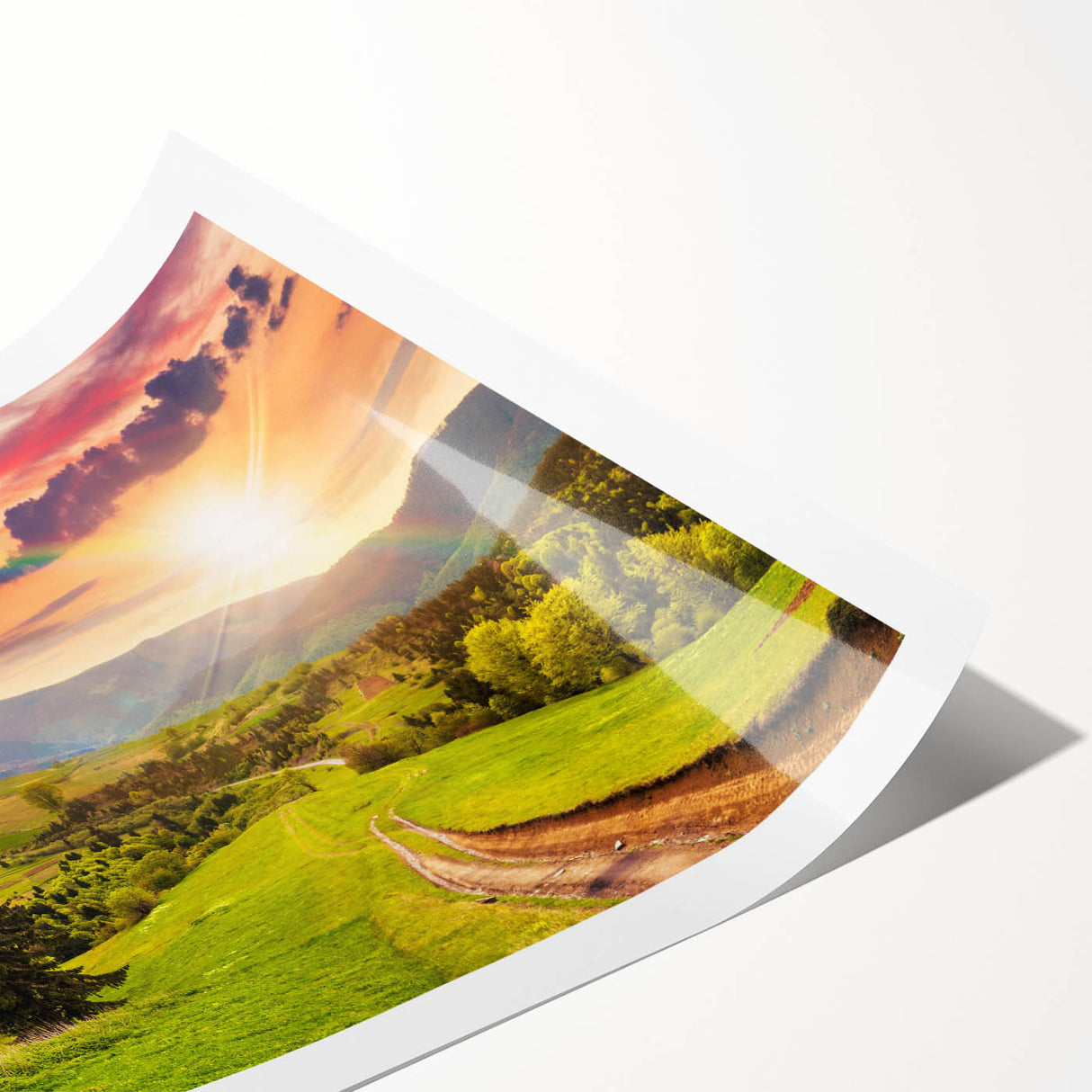 Vibrant rolled print of a serene valley landscape, showcasing lush green hills and a vivid blue sky, perfect for home decor in a nature-themed setting.
